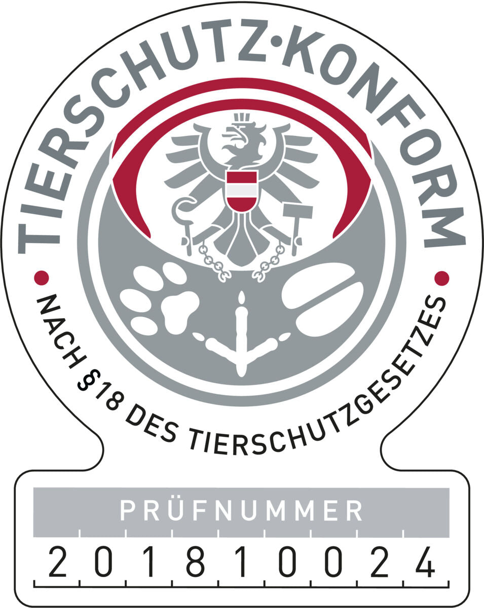 Rundes Siegel mit Adler und Pfotenabdrücken, Text "TIERSCHUTZKONFORM" und Prüfnummer 201810024.