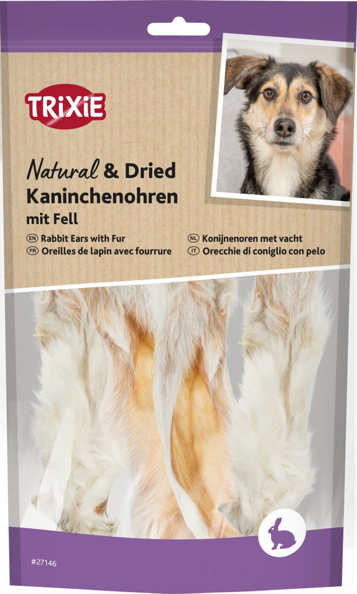 Verpackung mit getrockneten Kaninchenohren mit Fell, Markenname "Trixie", Bild eines Hundes, lila und braunes Design.