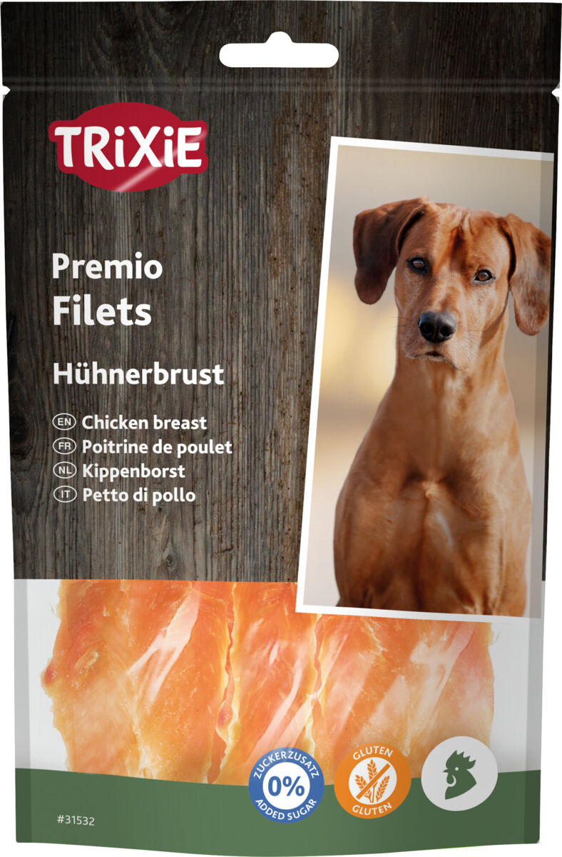 Hundesnacks-Verpackung von TRiXiE mit Hühnerbrust, Bild eines Hundes rechts, Texte in mehreren Sprachen, glutenfrei.