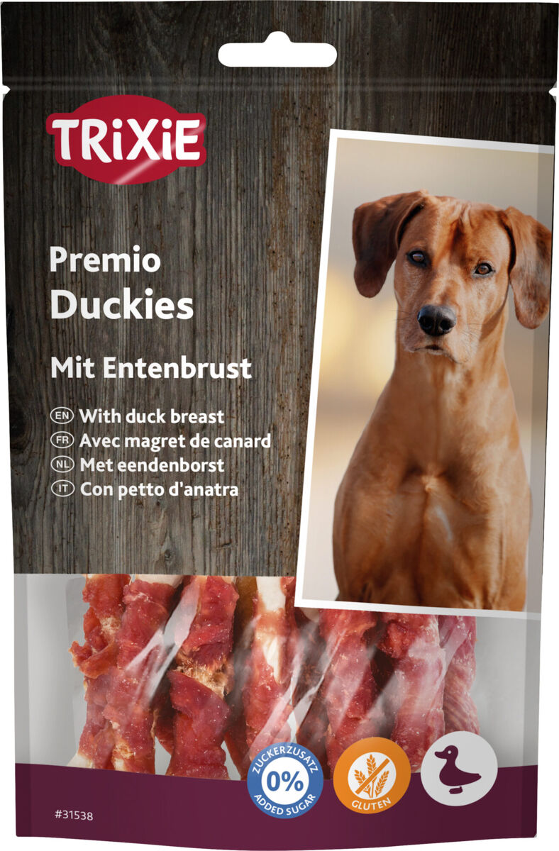 Verpackung von Trixie Premio Duckies mit Entenbrust, Bild eines Hundes, Aufschrift in mehreren Sprachen.