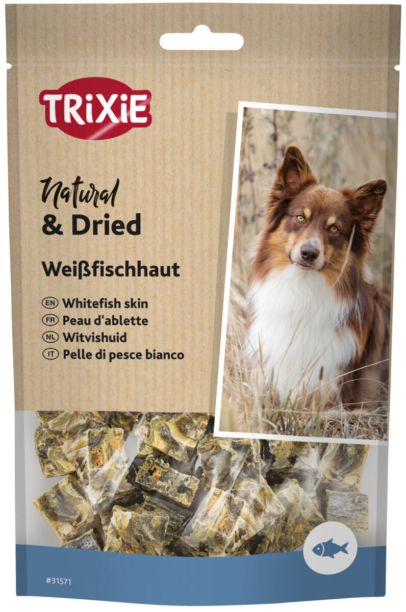 Verpackung von Trixie Hundeleckerli aus Weißfischhaut mit Bild eines Hundes und mehrsprachiger Beschreibung.