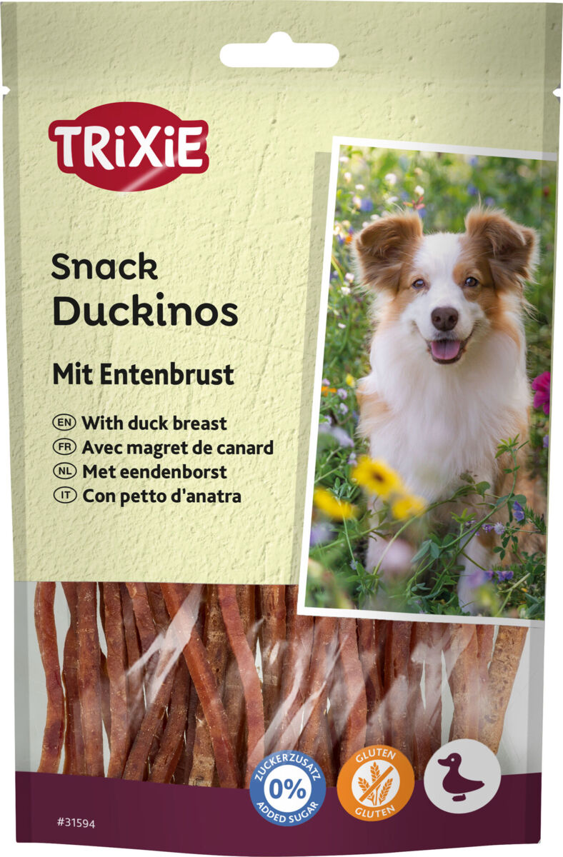 Verpackung von Hundesnacks der Marke Trixie, Duckinos mit Entenbrust, Abbildung eines Hundes in Blumenwiese.