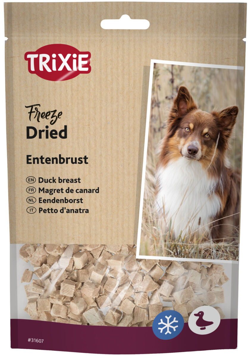 Die Verpackung zeigt TRIXIE gefriergetrocknete Entenbrust für Hunde mit einem Hundebild, Text in mehreren Sprachen und Symbolen.