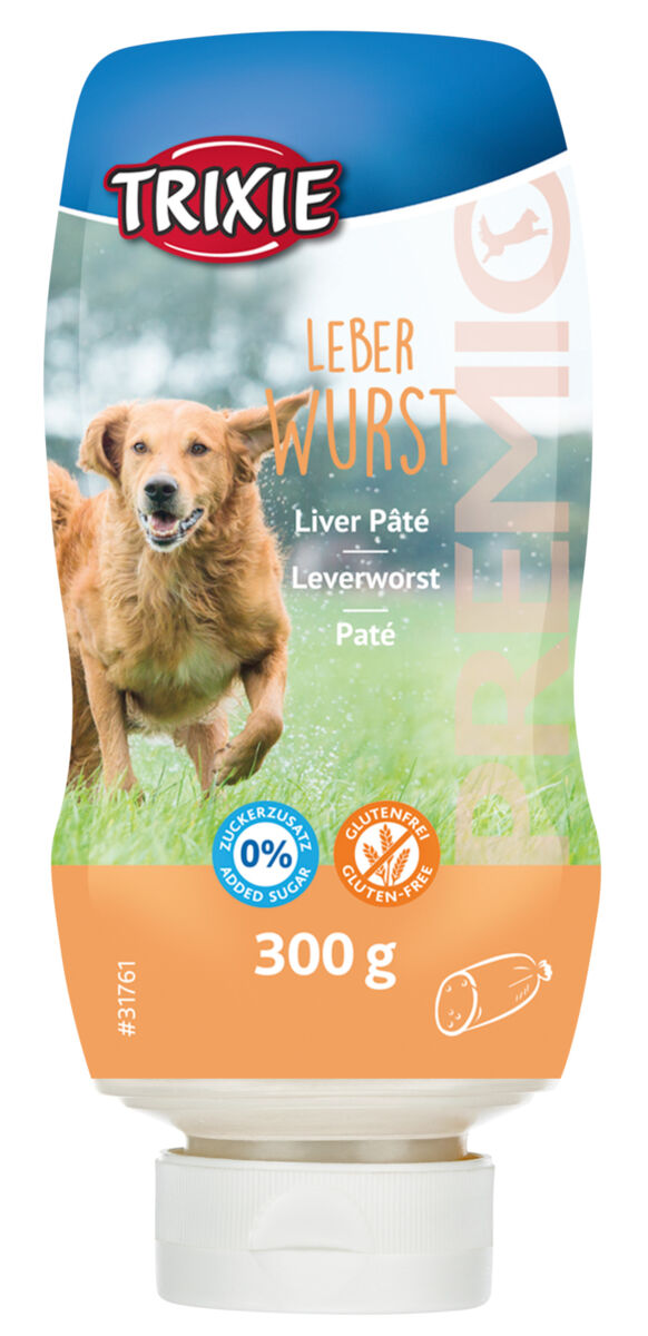 Eine Verpackung mit einem Bild von einem Hund auf einer Wiese, Aufschrift "Trixie Leberwurst", 300 g.