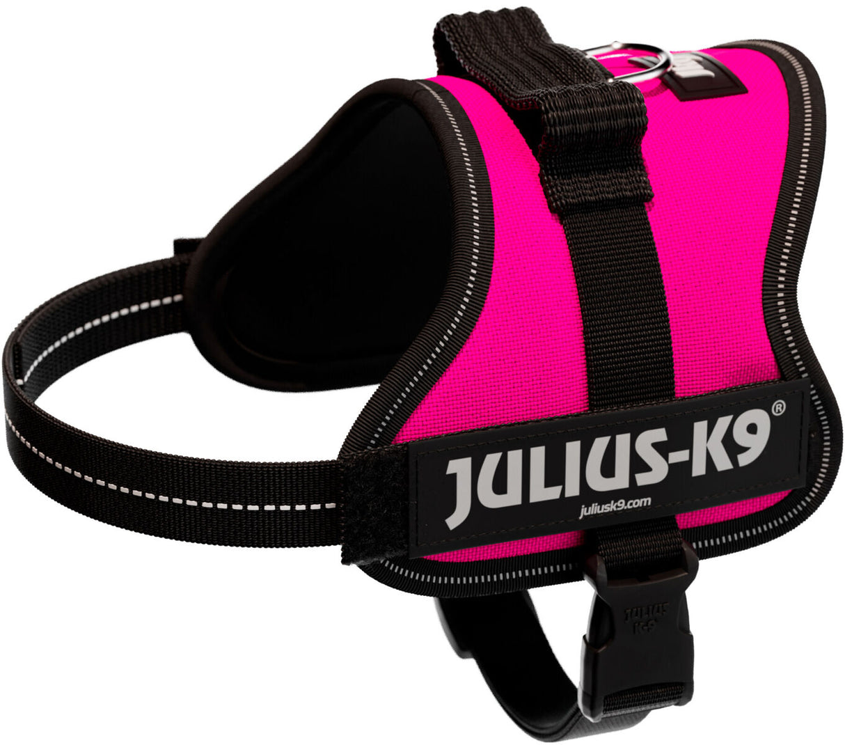 Pinkes Hundegeschirr mit schwarzem Rand und Reflektoren, Aufschrift "Julius-K9" sichtbar.