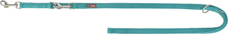 Türkisfarbene Hundeleine mit Metallkarabiner und D-Ring, Etikett mit Aufschrift "Trixie".