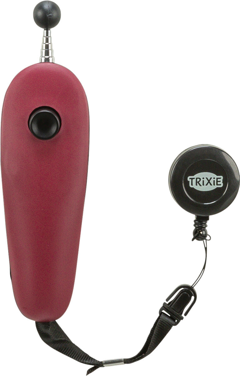 Roter Hundeklicker mit verstellbarer Antenne und Trixie-Logo auf schwarzer Rundplatte, verbunden durch ein Band.