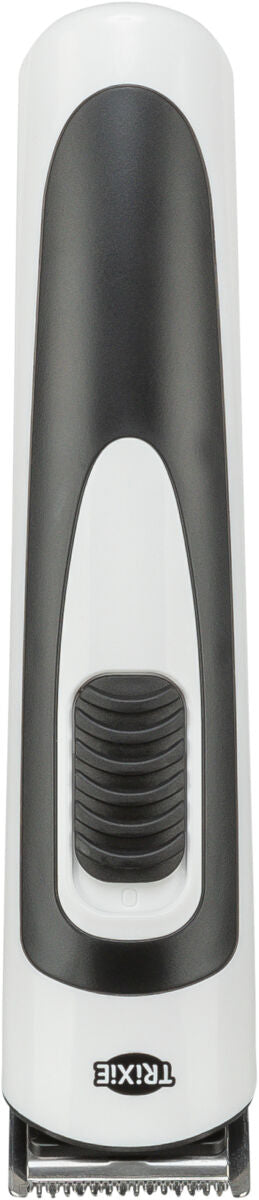 Schwarzer und weißer elektrischer Haarschneider mit sichtbarem Schaltknopf und darunter liegender Klinge.