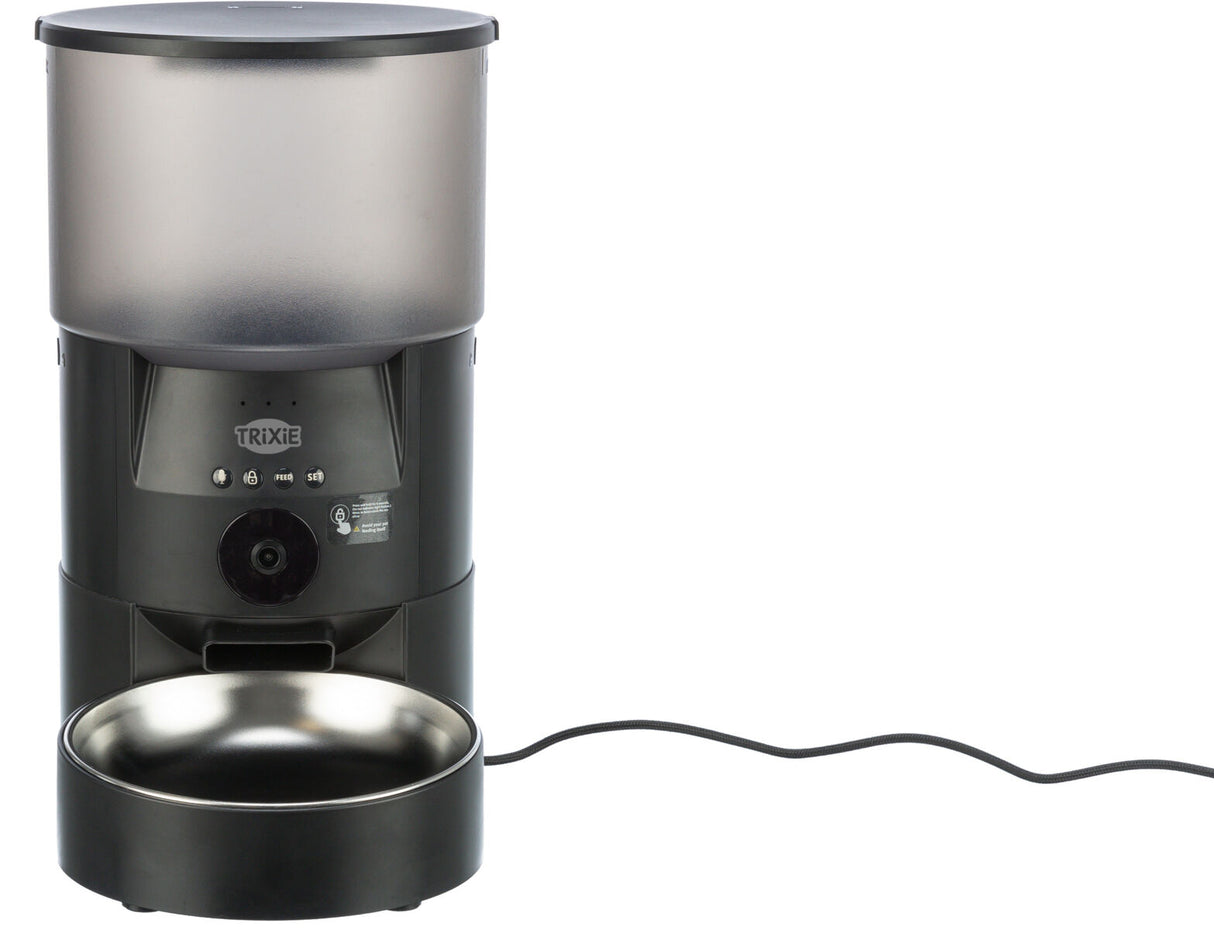 Schwarzer automatischer Futterspender mit transparenter Oberseite, vorne zwei Knöpfe und Schale aus Edelstahl.