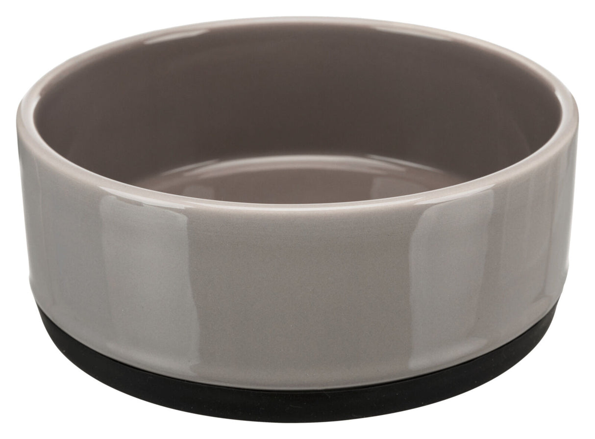 Graue, runde Schüssel aus Keramik mit schwarzem Sockel, glatt glänzend und schlichtes Design.