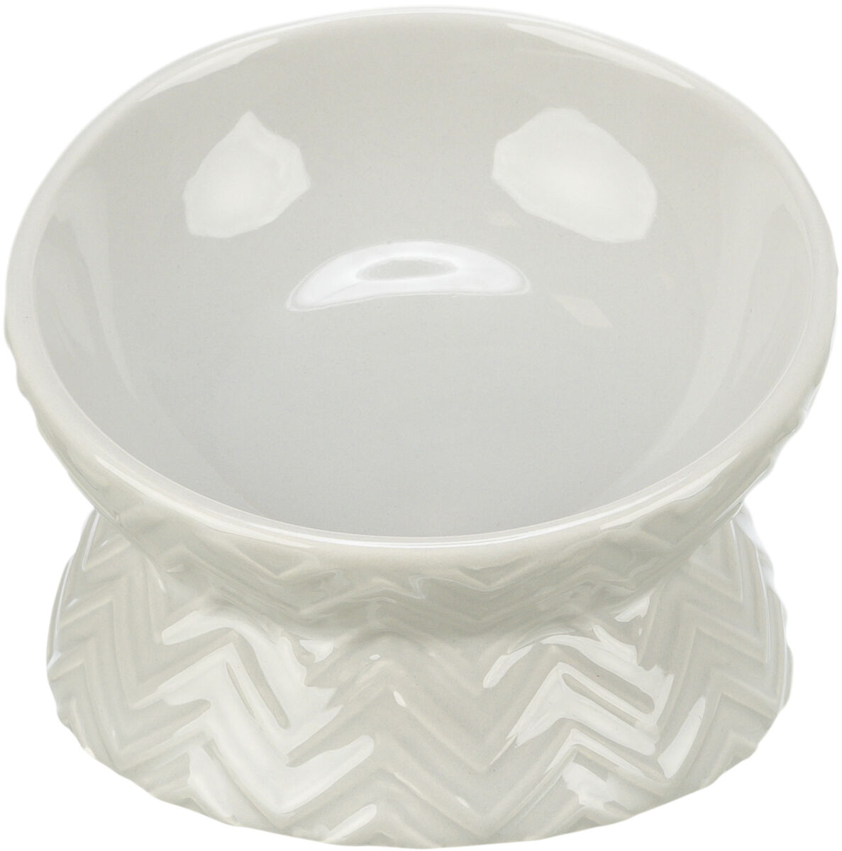 Weiße Keramikschale mit erhabenem Zickzackmuster auf erhöhtem Sockel, glänzende Oberfläche.