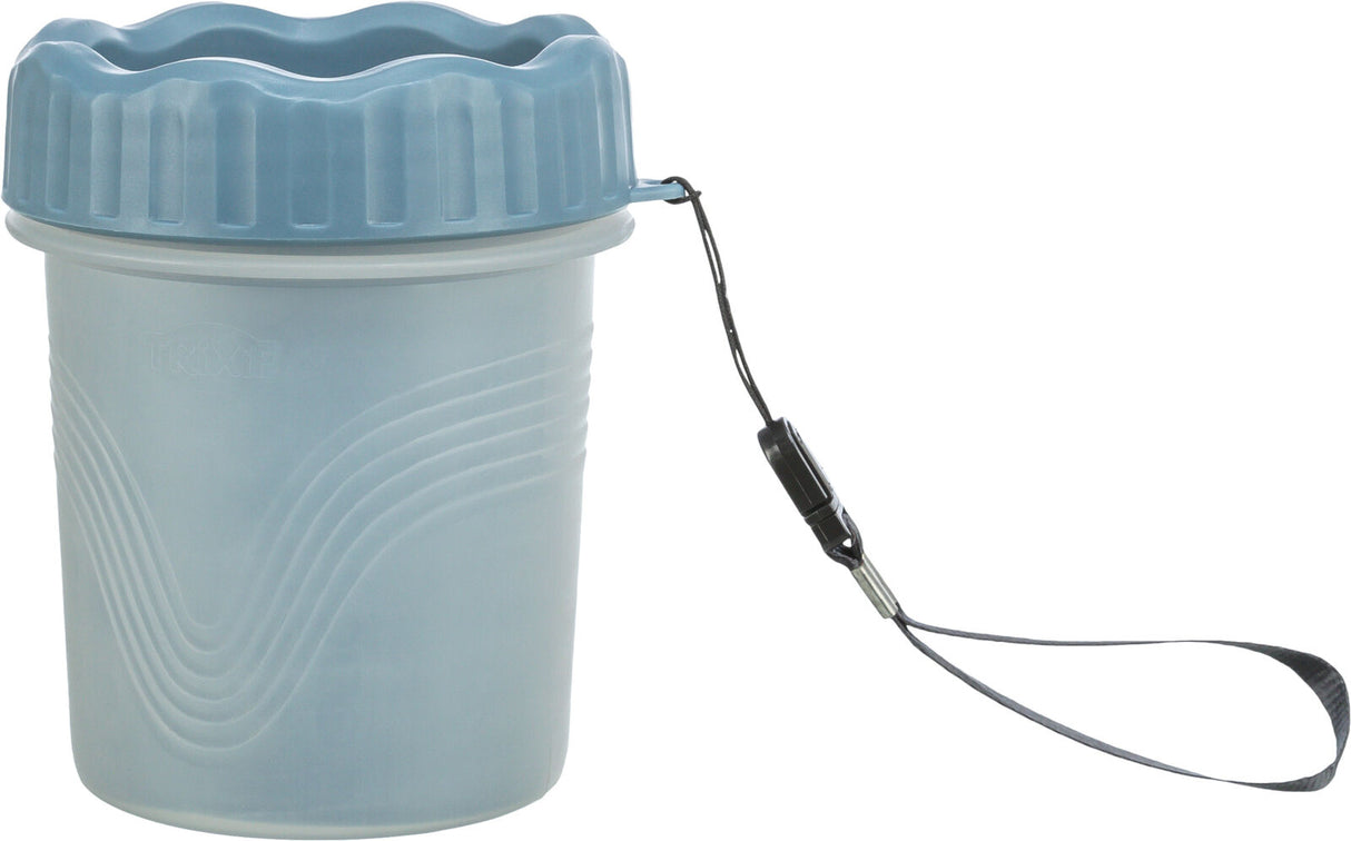 Transparenter Behälter mit blauer, gewellter Öffnung und schwarzem Trageriemen, auf der Seite steht "Trixie".