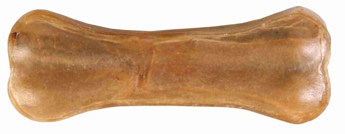 Ein brauner, länglicher Hundeknochen mit glatter Oberfläche und leicht unregelmäßiger Form.