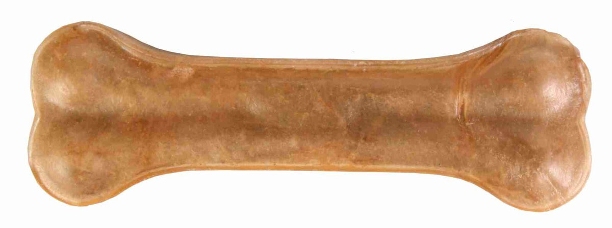 Brauner knochenförmiger Kauknochen aus gepresstem Material, Oberfläche glatt und glänzend.