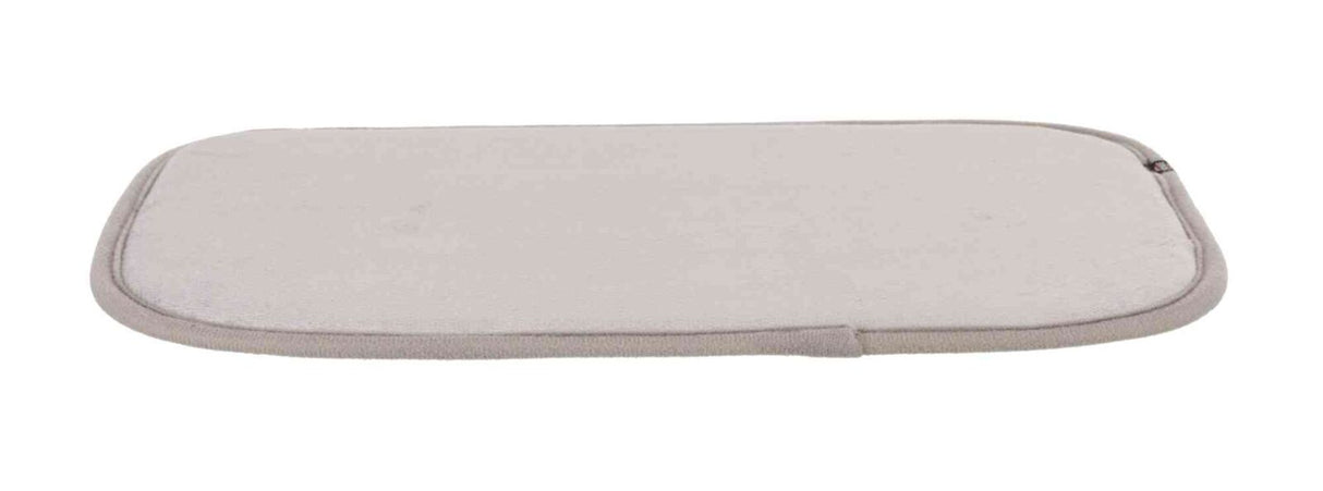 Beigefarbene rechteckige Matte mit leicht abgerundeten Ecken und einer dünnen Polsterung.