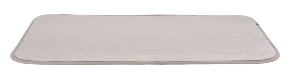 Rechteckige, flache, beigefarbene Matte mit abgerundeten Ecken und glatter Oberfläche.