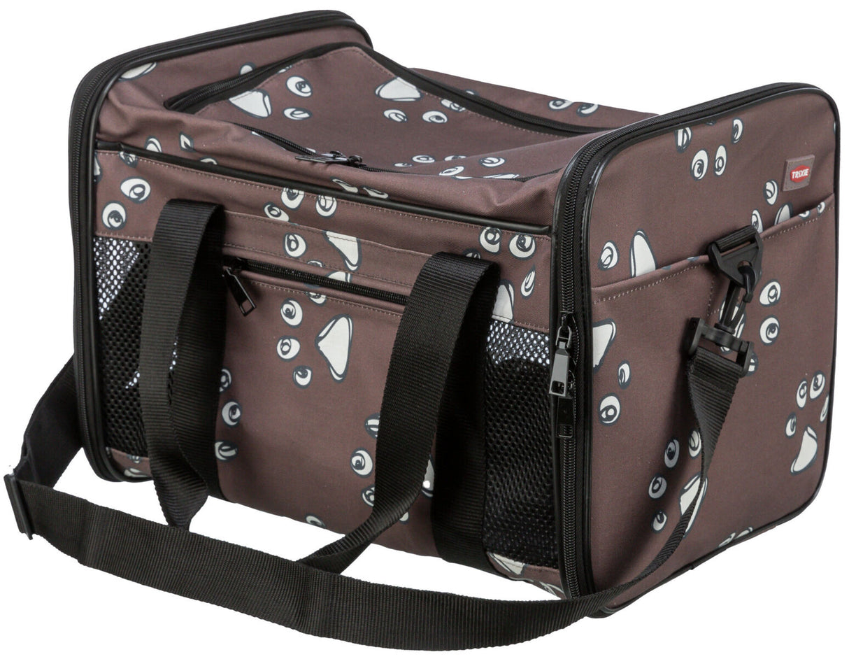 Braune Tragetasche mit Hundeaugenmuster, zwei Tragegurten, Reißverschluss und seitlichen Netzeinsätzen.
