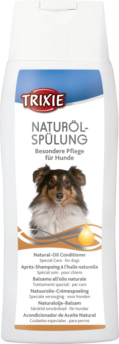 Hundespülung mit Naturöl von Trixie, weiße Flasche mit blauem Etikett, Hund und Tropfensymbol abgebildet.