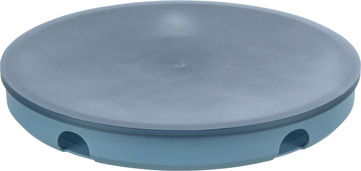 Runde, flache Scheibe aus blauem Kunststoff mit kleinen Öffnungen am Rand.