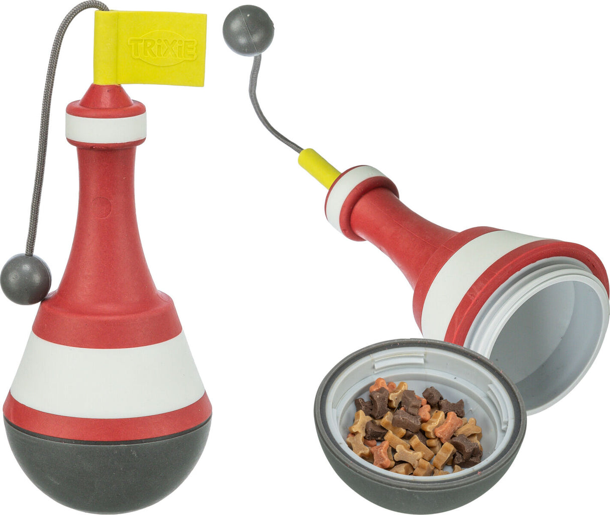 Rotes und weißes Spielzeug mit gelber Flagge, geöffnet mit kleinen bunten Hundeknochen im Inneren.