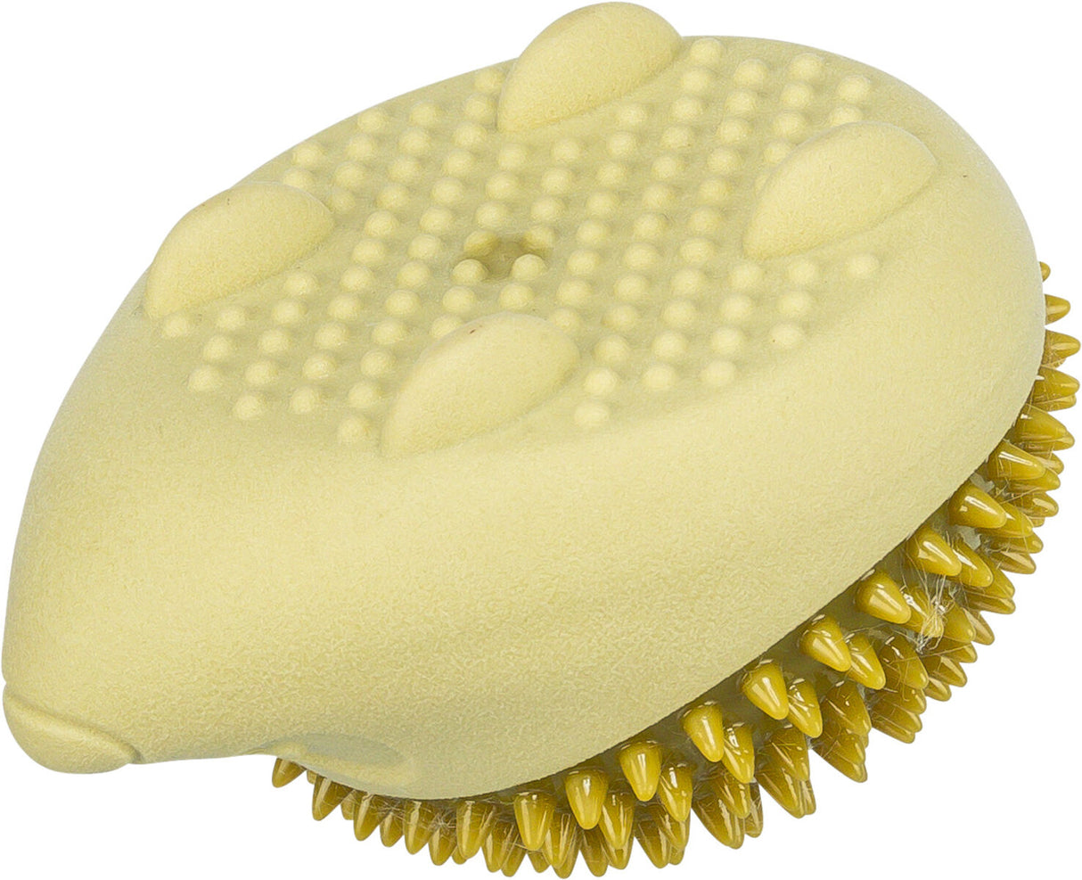 Gelbe ovale Bürste mit kurzen Noppen auf einer Seite und längeren spitzen Borsten auf der anderen Seite.