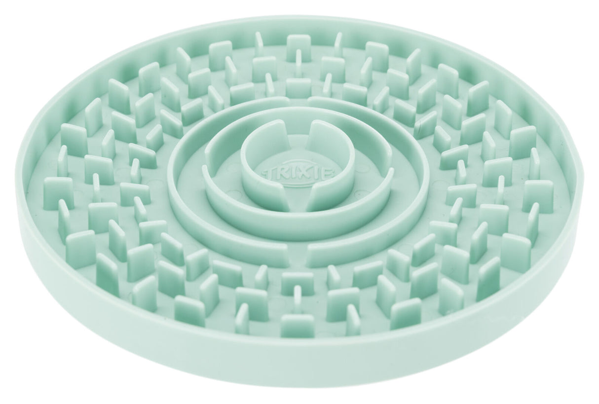 Runde, mintgrüne Kunststoffmatte mit erhöhten Strukturen und konzentrischen Kreisen auf der Oberfläche.