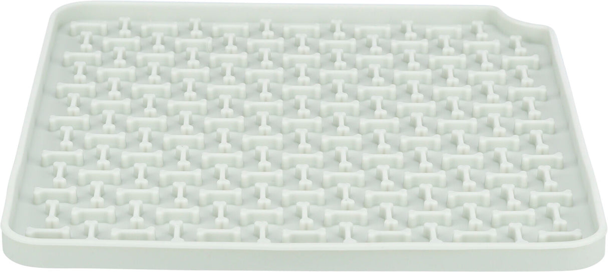 Weiße Kunststoffmatte mit erhöhtem Knochenmuster in einem rechteckigen Design.