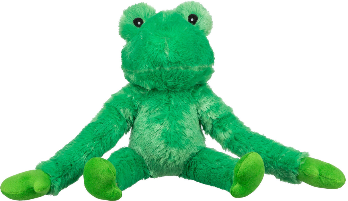 Ein grünes, plüschiges Frosch-Spielzeug mit langen Beinen und großen, aufgenähten Augen sitzt vor weißem Hintergrund.