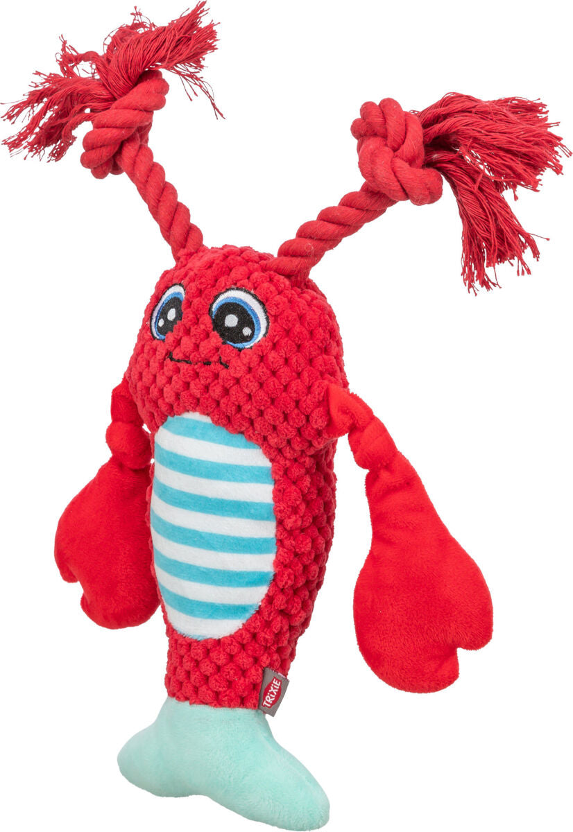 Rotes Plüschspielzeug mit großen Augen, gestreiftem Bauch und zwei Seilen als Fühler, türkisfarbenem Schwanz.