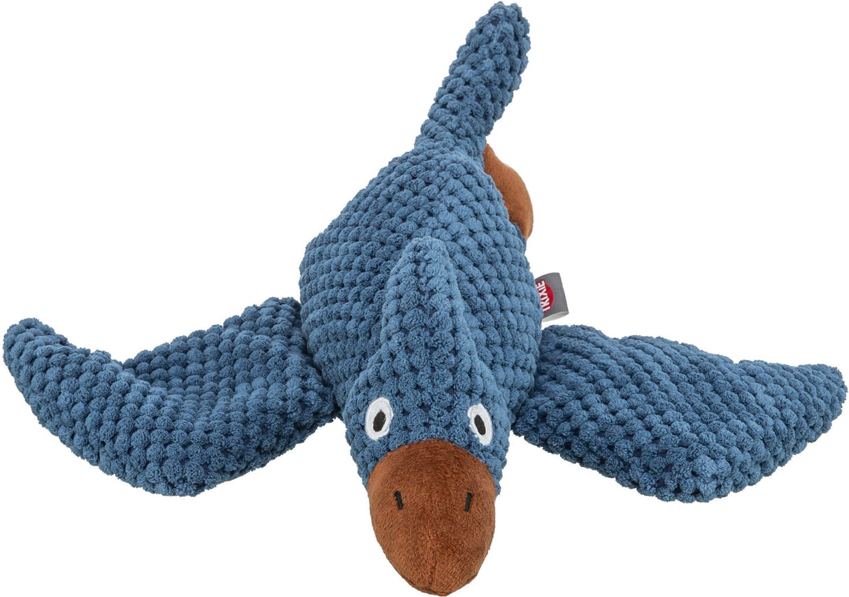 Blaues Plüschspielzeug in Form eines Tieres mit Flügeln und braunem Schnabel, strukturiertes Material.