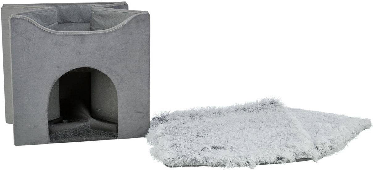 Graue quadratische Höhle mit offenem Eingang und daneben liegendem flauschigen, grauen Kissen.