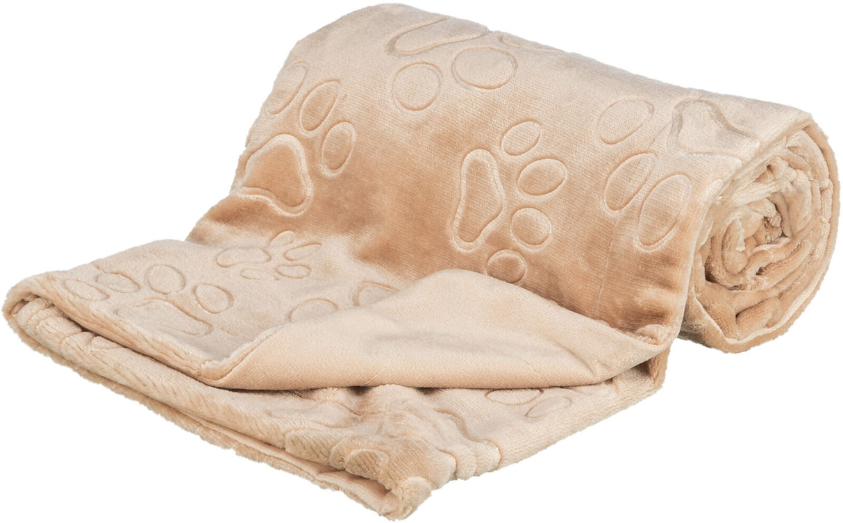 Beige Decke mit aufgedruckten Pfotenmustern, teilweise aufgerollt, weiches Material.