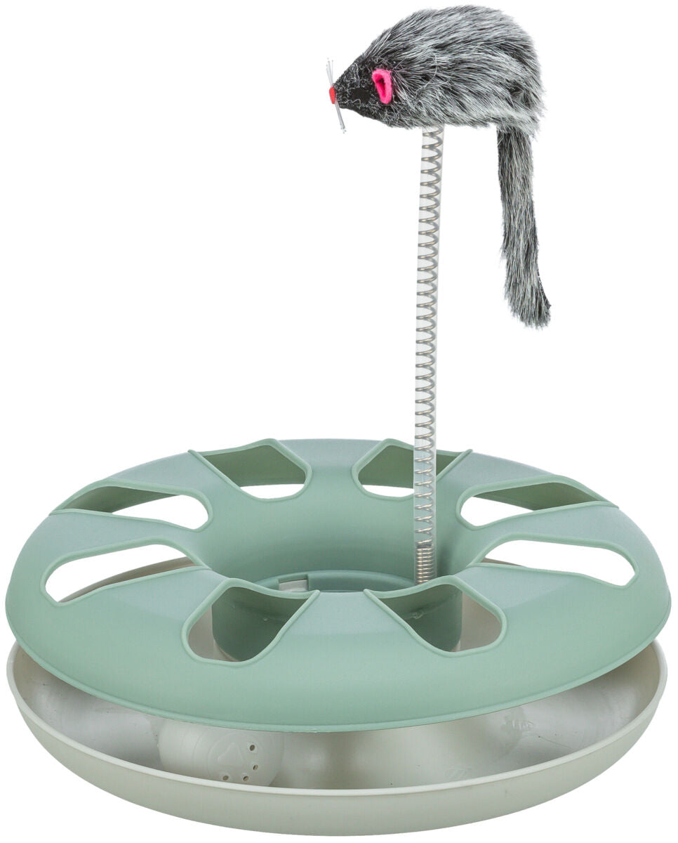 Spielzeug mit grüner, runder Basis, darin weiße Bälle, oben befestigt ein grauer Stoffmaus-Kopf an einer Spirale.