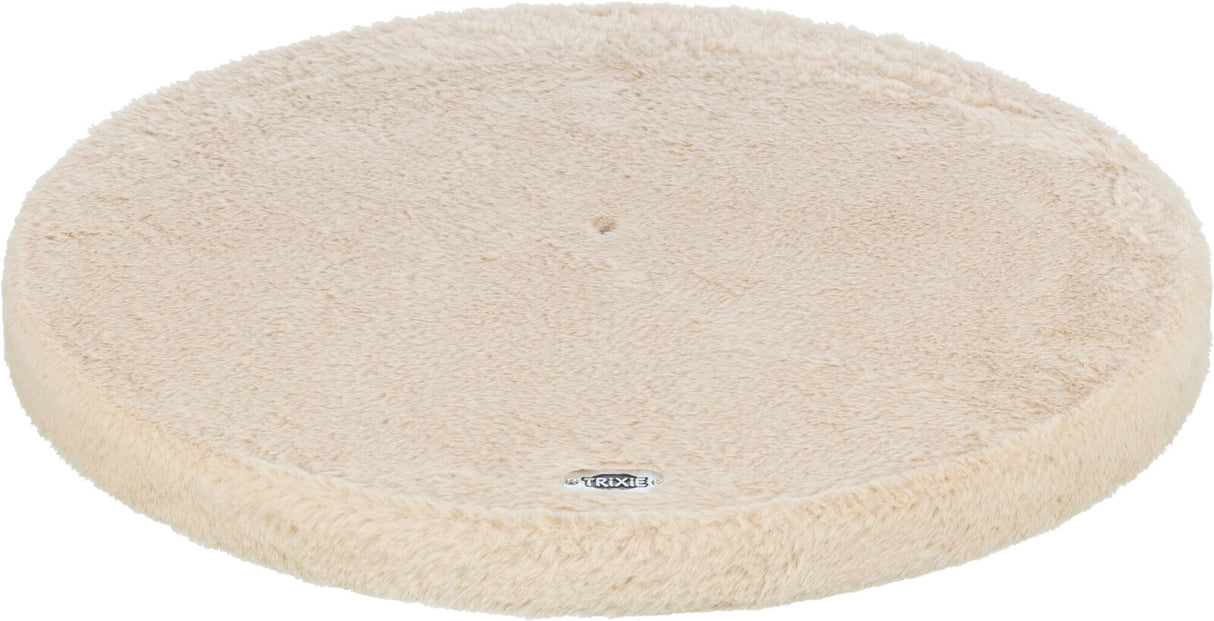 Rundes, beiges, flauschiges Kissen mit eingeprägtem Logo "Trixie" an der Unterseite, Oberfläche samtig.