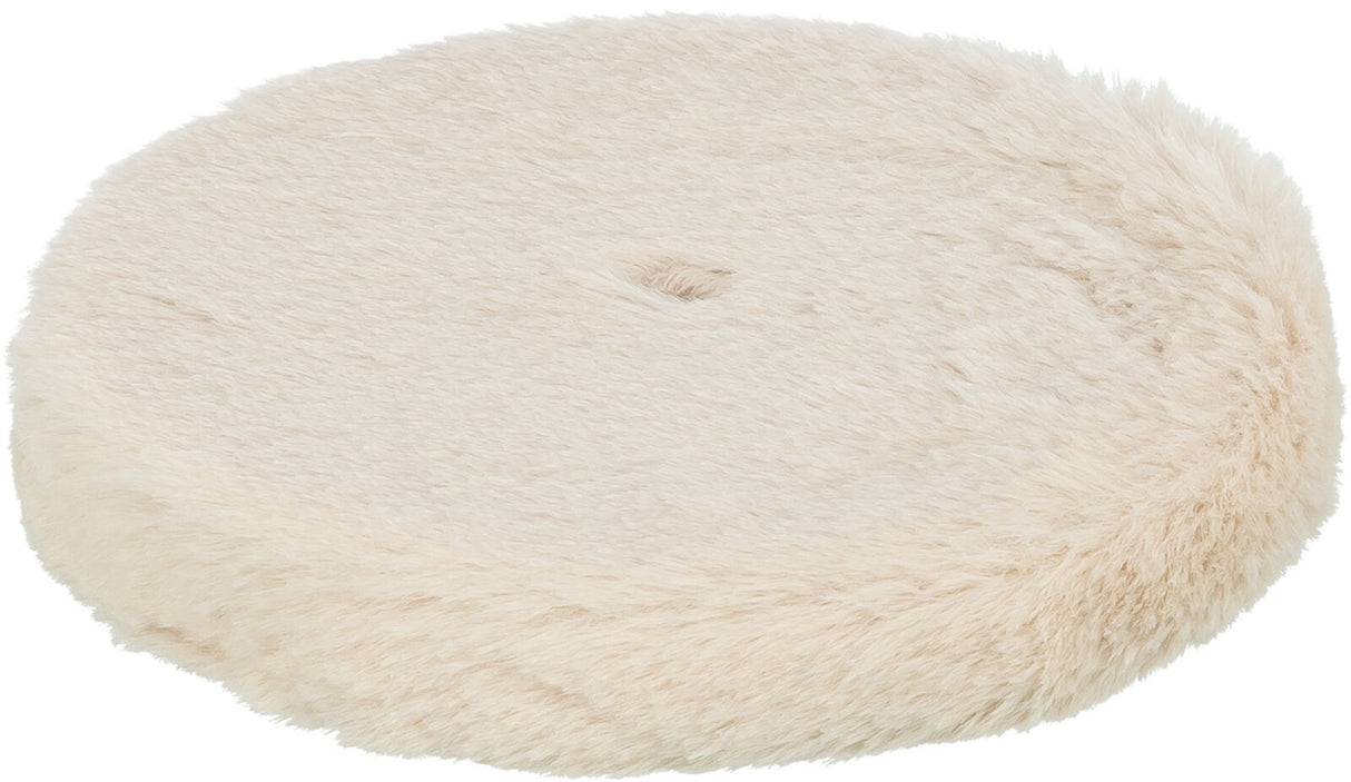 Rundes, hellbeiges, flauschiges Kissen mit weicher Oberfläche.