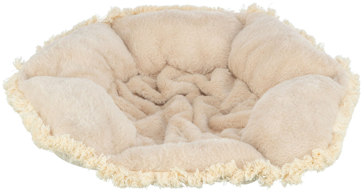 Beiges, rundes, flauschiges Kissen mit Fransenrand aus weichem Stoff, sichtbar von oben.