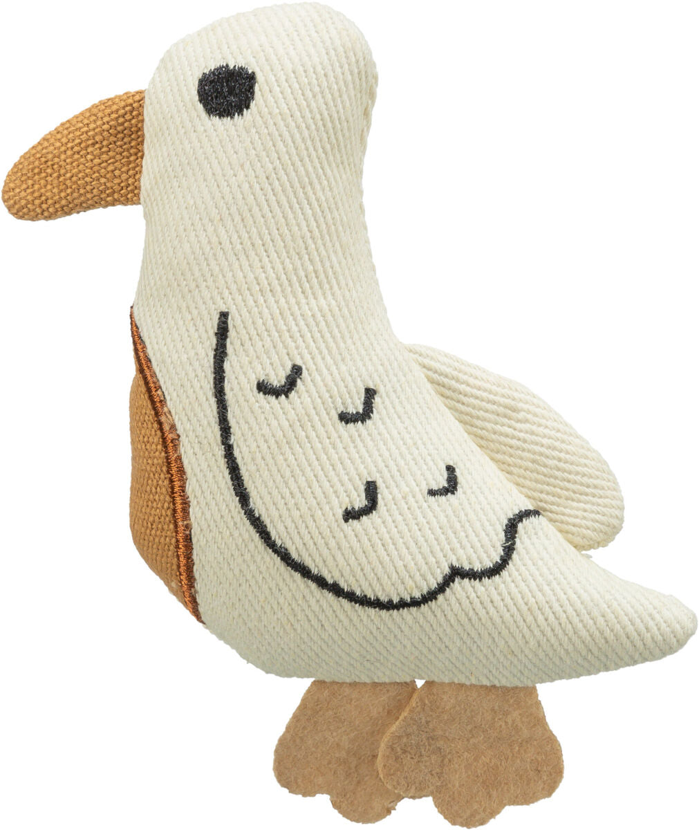Stofftier in Form eines Vogels mit weißem Körper, braunem Schnabel und beigen Füßen, mit gestickten schwarzen Details.
