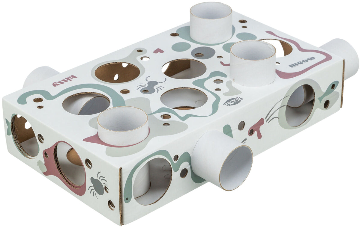 Weiße rechteckige Kartonbox mit runden Öffnungen und aufgedruckten Grafiken, inkl. Wörter "kitty" und "meow".