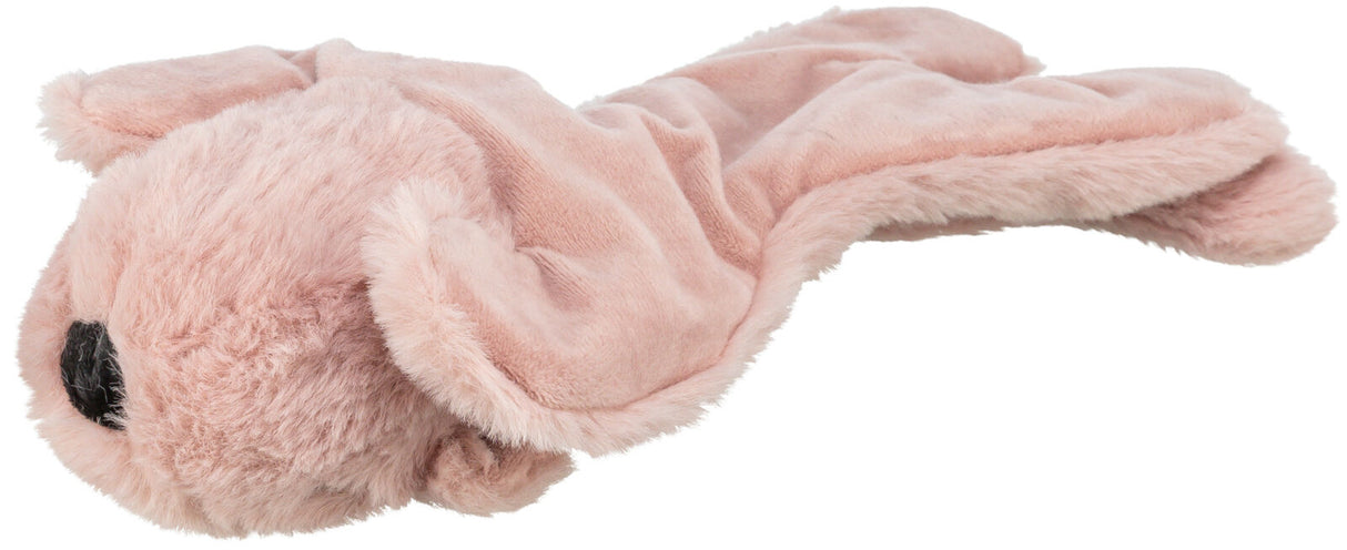 Weiches, rosafarbenes Plüschspielzeug in Hundegestalt mit schwarzem Nasenbereich.