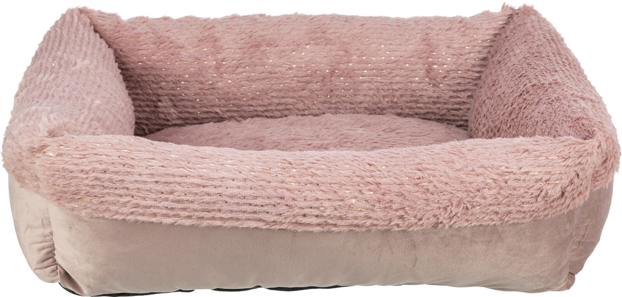Rechteckiges, flauschiges rosafarbenes Bett mit glänzenden Akzenten und erhöhten weichen Rändern.