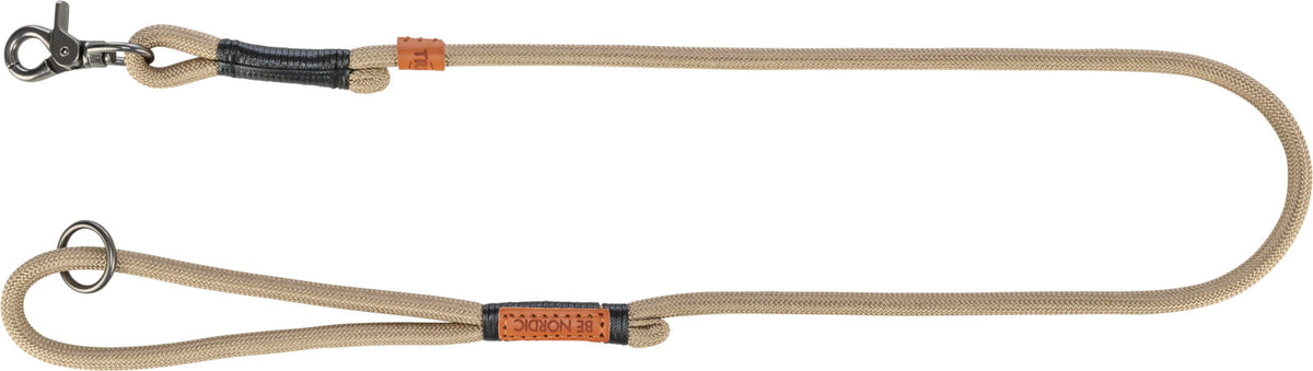 Beige Hundeleine mit schwarzem Griffstück, Metallschnalle und zwei braunen Lederakzenten.