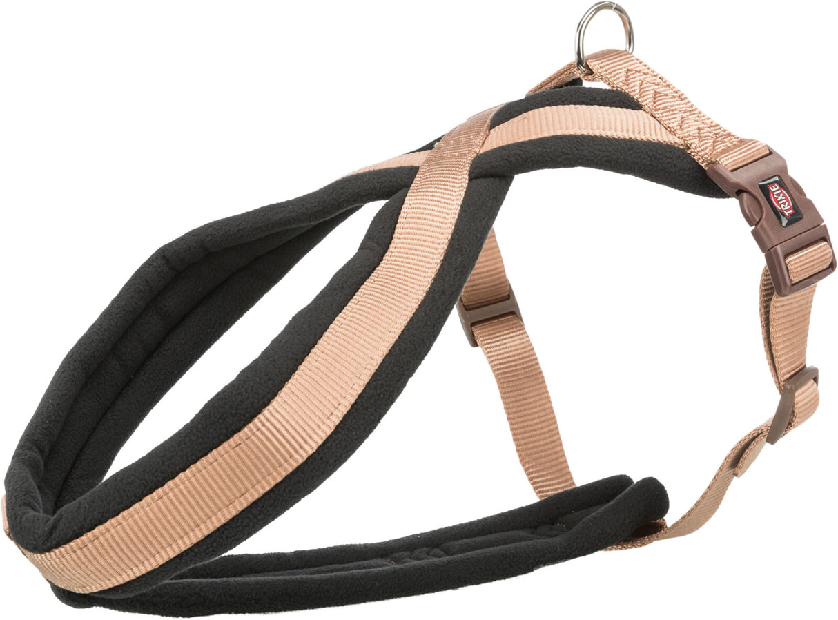 Ein beige und schwarzes Hundegeschirr mit Polsterung und Schnallen aus Kunststoff, inklusive Metallring.