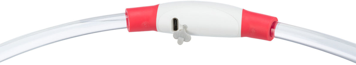 Transparenter Schlauch mit weißem Mittelteil und roten Verbindungen, USB-Schnittstelle sichtbar.
