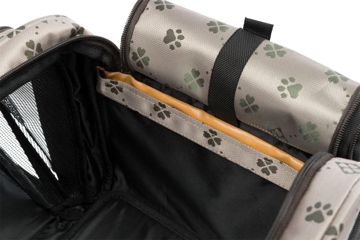 Graue Tasche mit schwarzem Innenfutter und Pfotenabdruckmuster, gepolsterte Seiten und Mesh-Bereiche.