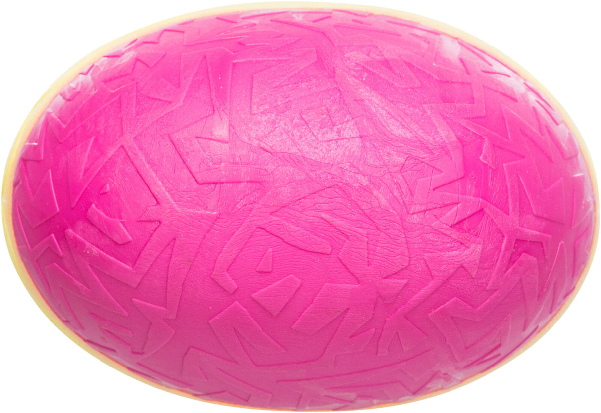 Ein ovales, pinkes Objekt mit strukturiertem Muster auf der Oberfläche, leicht erhabene Linien sichtbar.