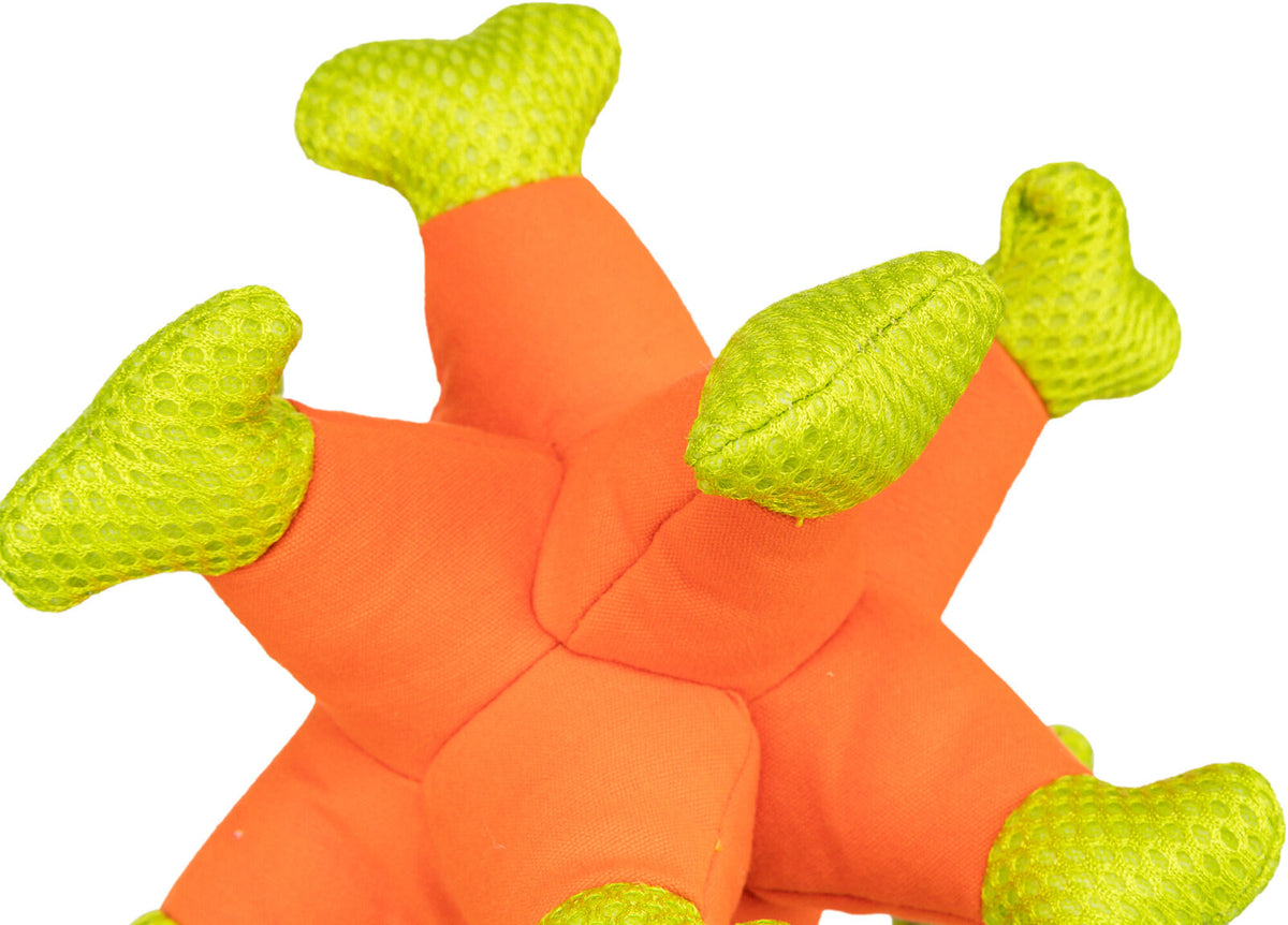 Orange- und limettengrünes Spielzeug mit mehreren abgerundeten Spitzen, Textur gut sichtbar.