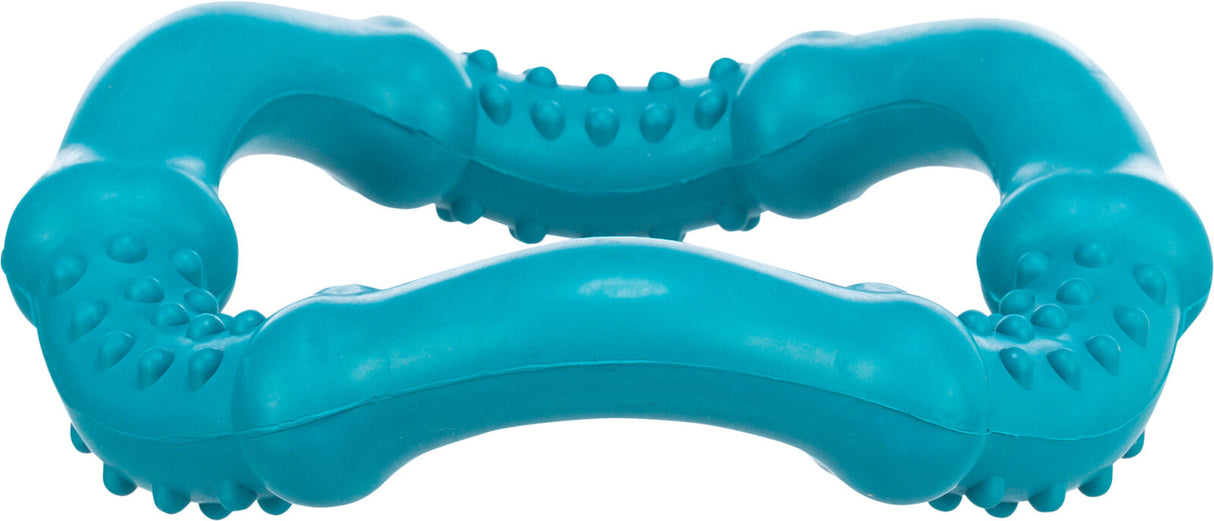 Türkises, gebogenes Spielzeug mit Erhebungen auf der Oberfläche.