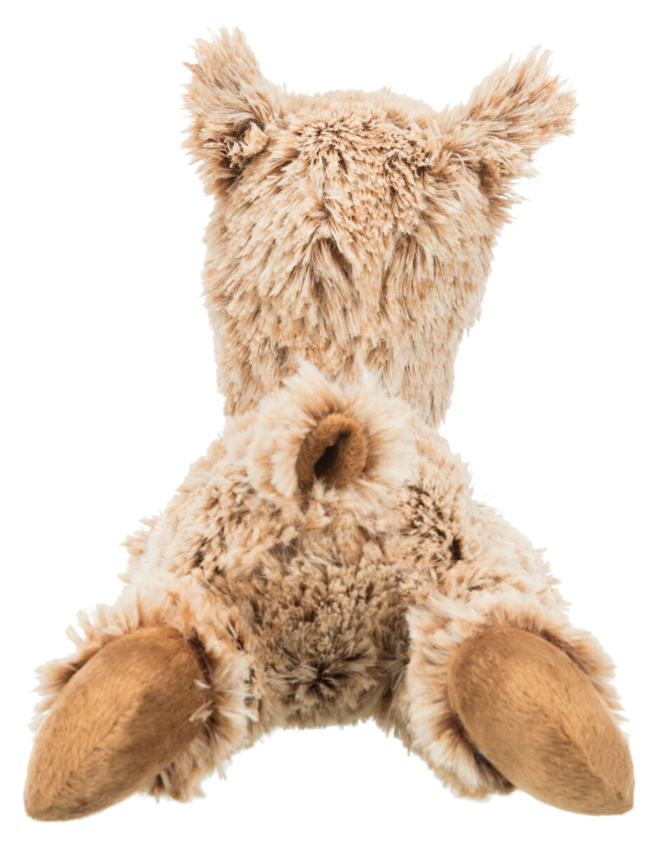 Ein plüschiges, beige-braunes Kuscheltier mit Ohren und Pfoten, das von hinten betrachtet wird.