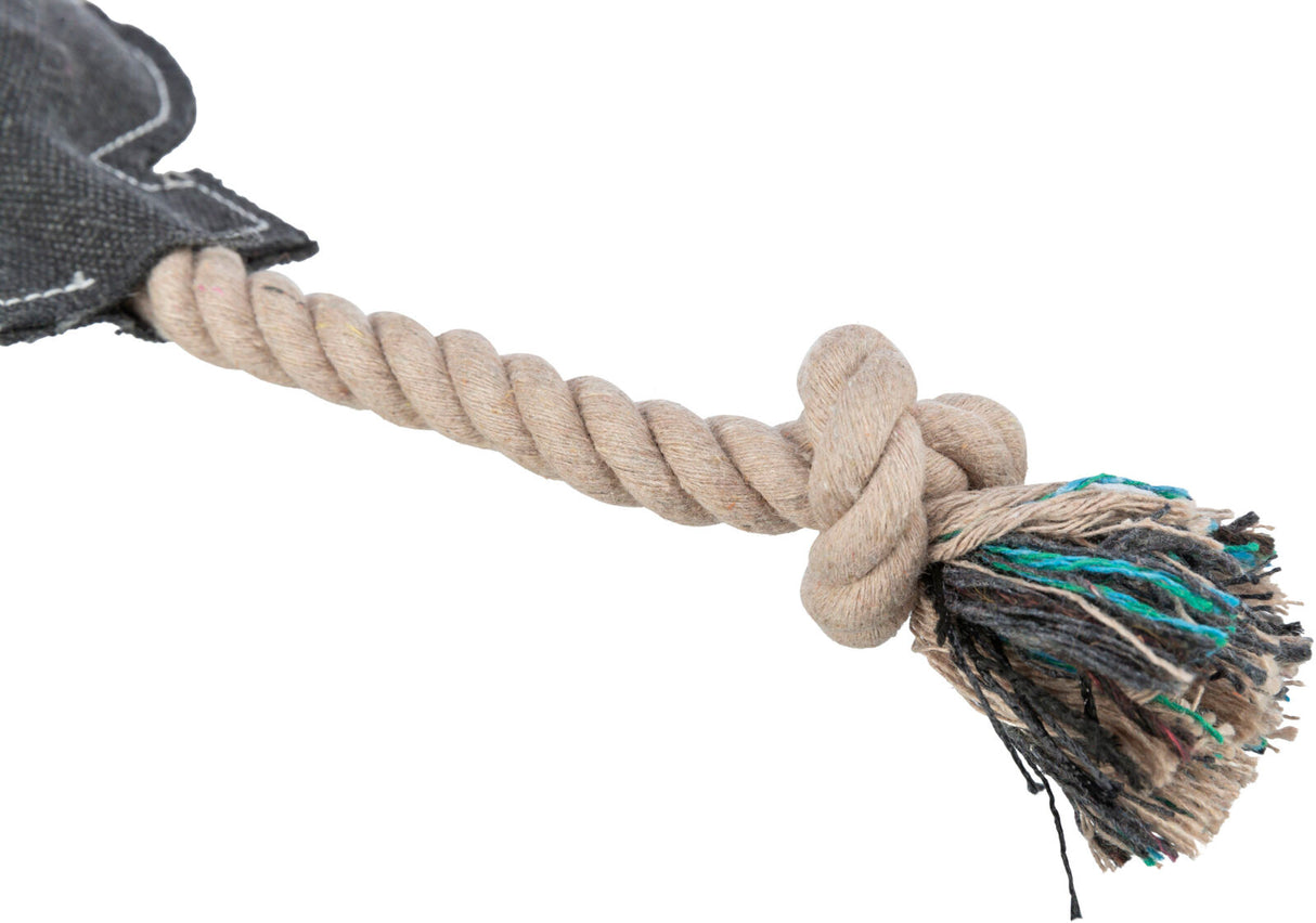 Beiges, gedrehtes Seil mit Knoten und bunten Fransen an einem Ende.