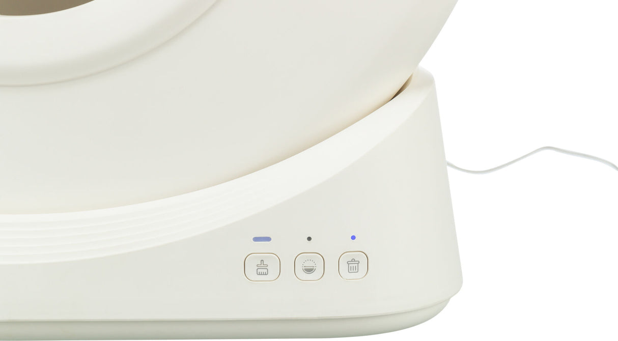 Weißes Gerät mit drei Knöpfen und blauen Lichtern, rechteckiger Rahmen und Kabel an der Seite.